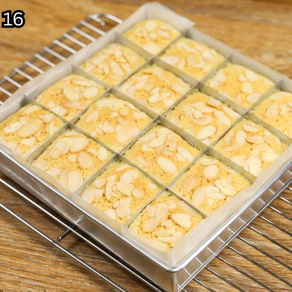 Freshly baked Condensed Milk Cake Bars cooling completely on a wire rack.